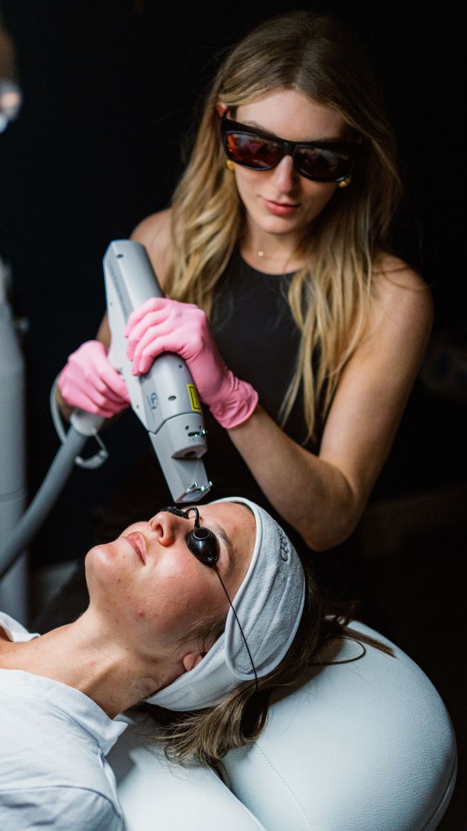 Laser treatment session in a beauty clinic.